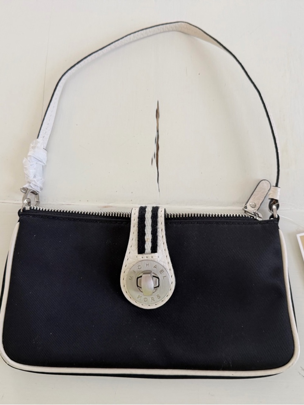 Michael Kors Black and White Turn-Lock Wristlet